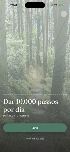 O app Reveal the Dream mostrando uma foto de floresta totalmente coberta no primeiro dia de uma jornada de trinta dias para fazer 10.000 passos por dia.