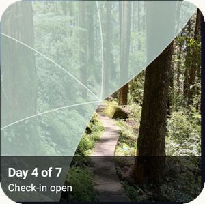 The Reveal the Dream home screen widget showing a partly uncovered forest path with the label Day 4 of 7, check-in open.